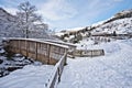 Winter scene of Wooden bridge in Gourette mountain village Royalty Free Stock Photo